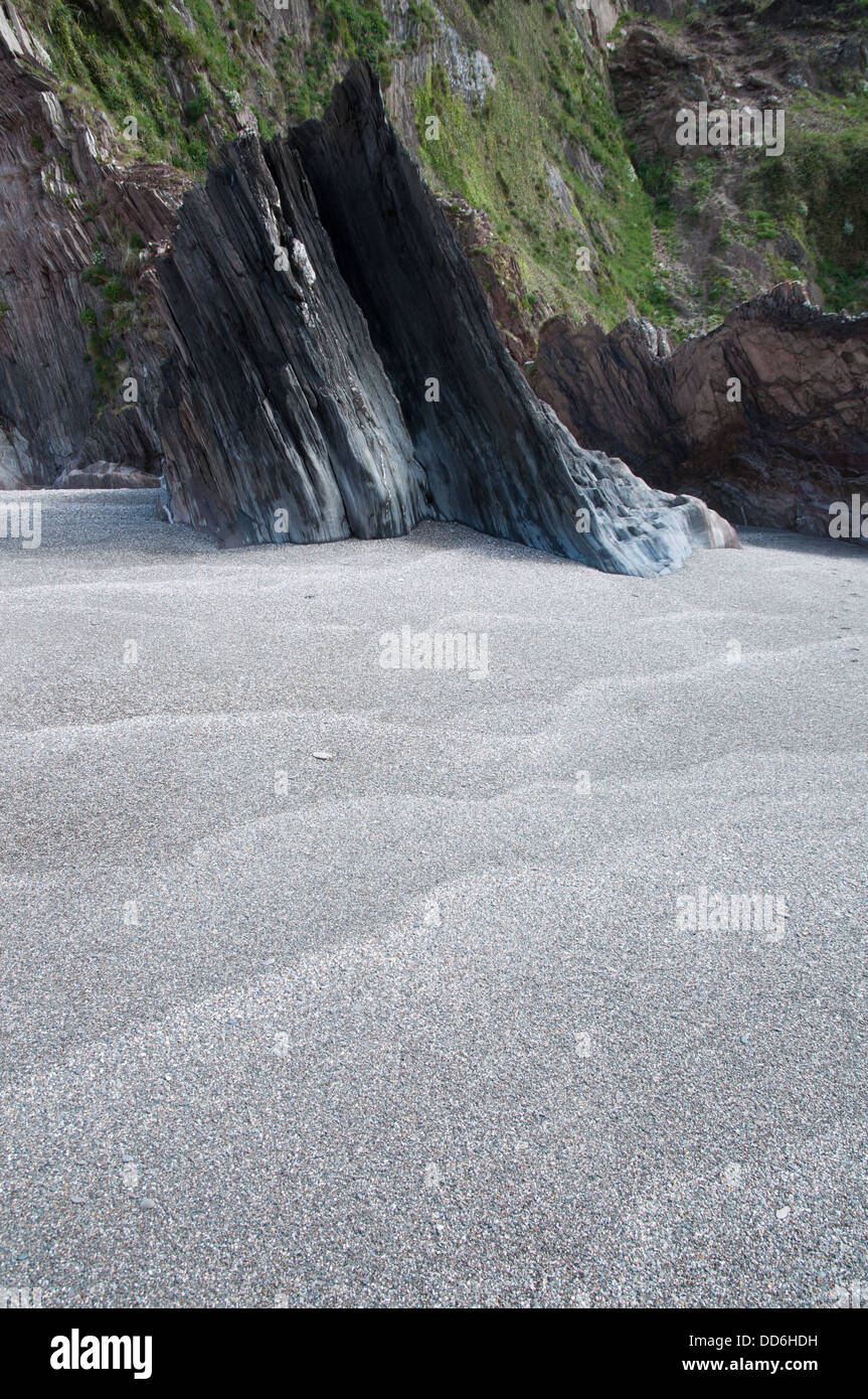Tide-mark patterns left in sand on isolated beach Stock Photo