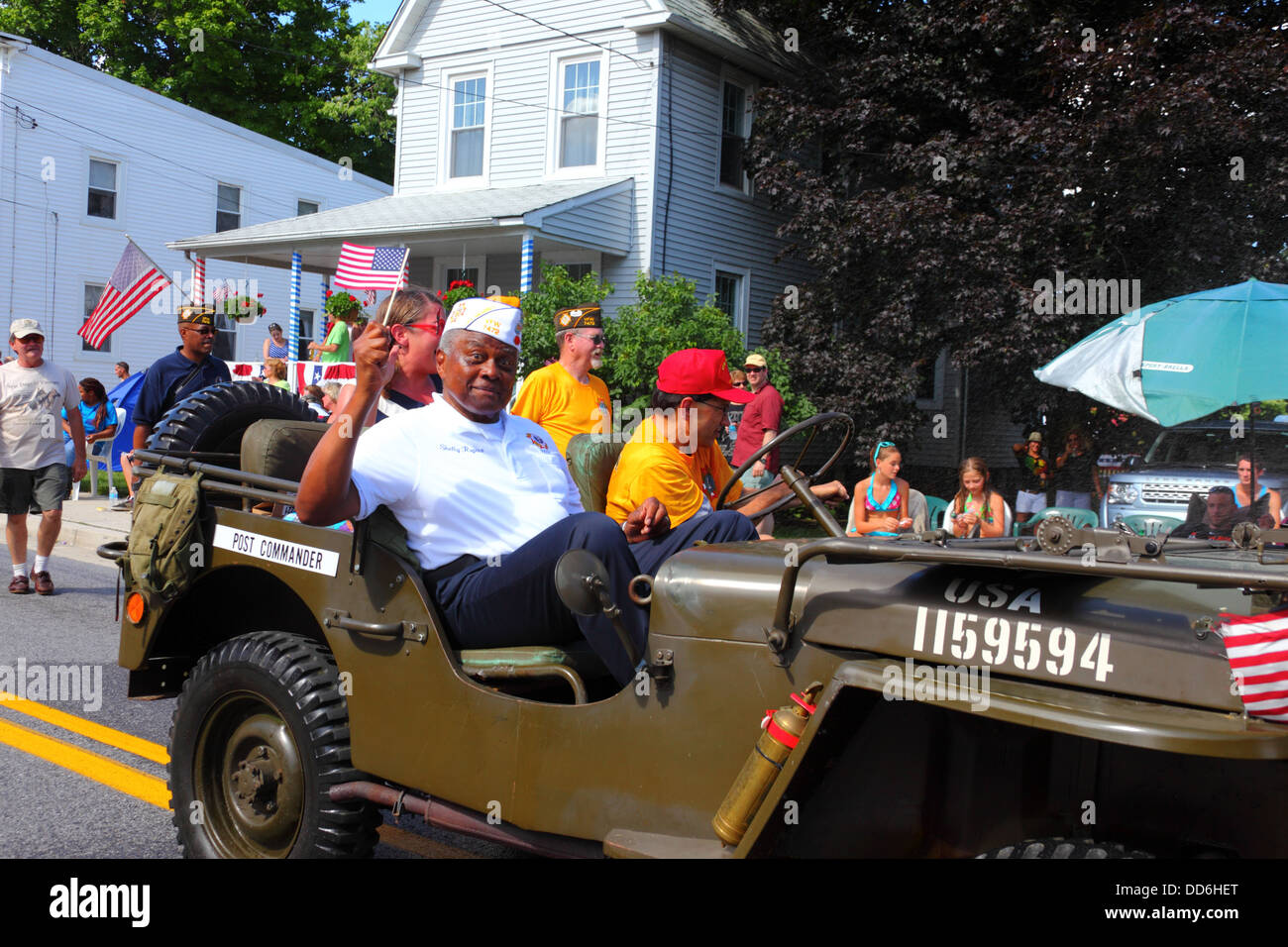 African American soldier in army jeep taking part in 4th of July Independence Day parades, Catonsville, Maryland, USA Stock Photo