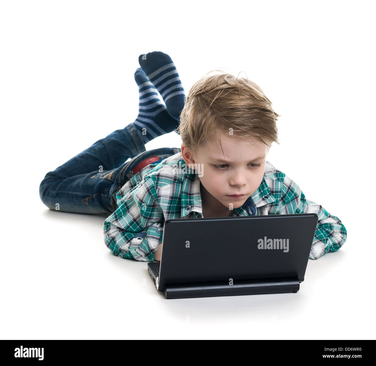 The boy with the laptop on a white background Stock Photo - Alamy