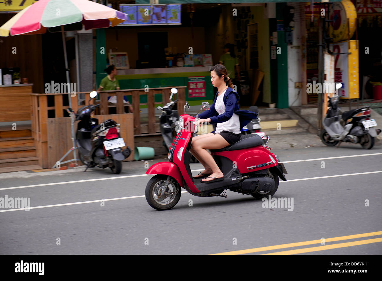 Moped and bicycles are a popular mode of transport in Taiwan Stock ...