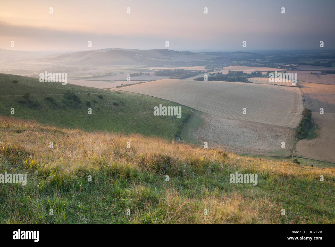 Sunset across the South Downs from Firle Beacon, Sussex, England. Stock Photo