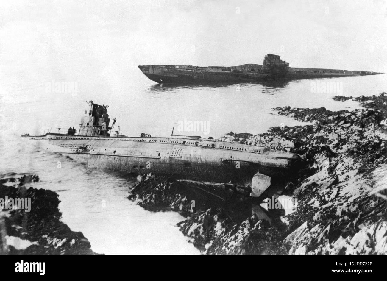 Two German U-boats washed up on the rocks at Falmouth, England, in 1921. Both were sunk during World War I. Stock Photo