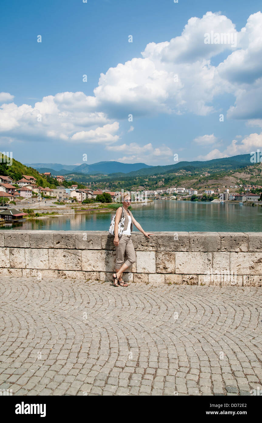 beautiful woman on the bridge over Drina river Stock Photo