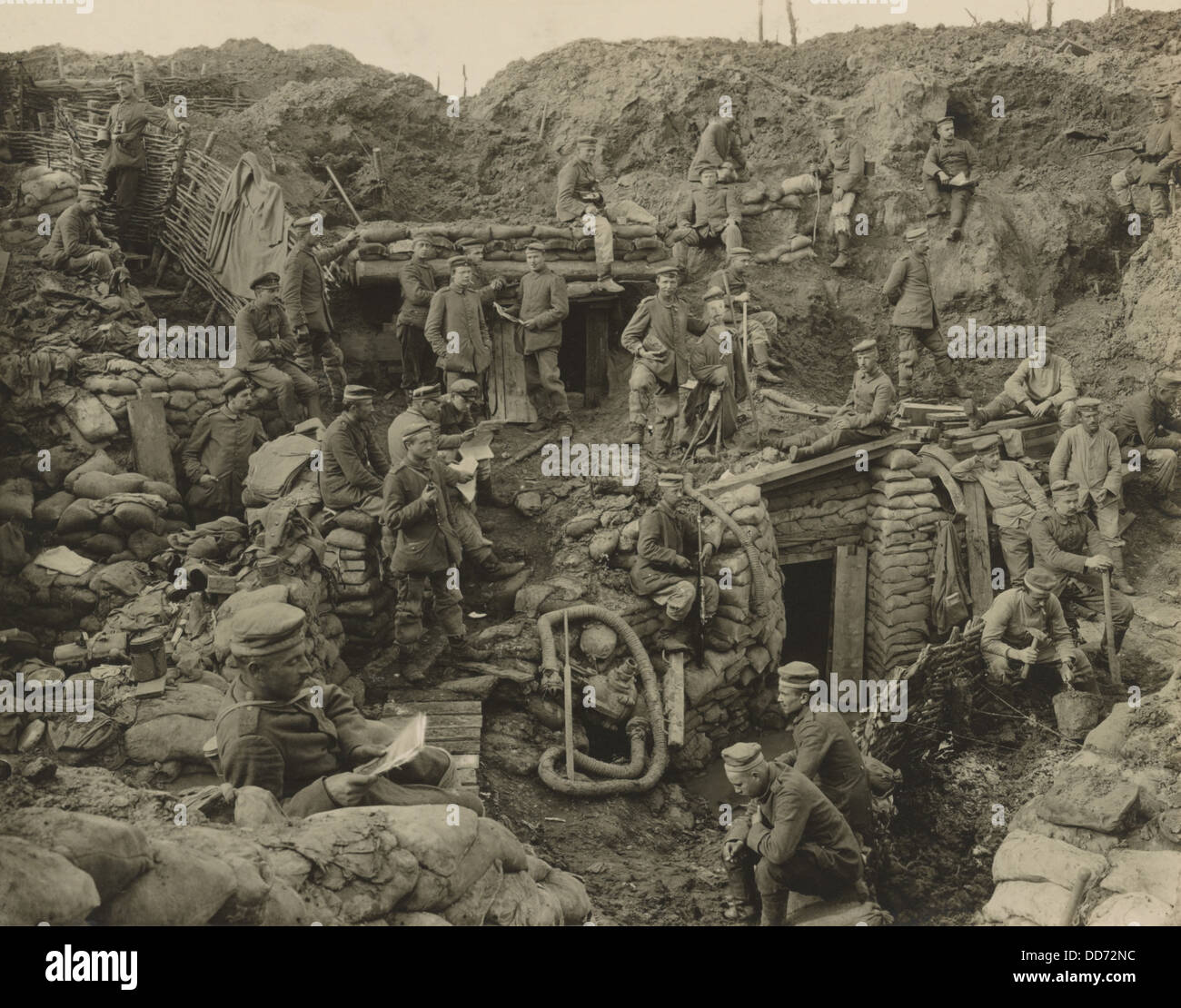 WW1 photo of German soldiers relaxing outside wood shelter WW1 photo of German soldiers relaxing outside wood shelter