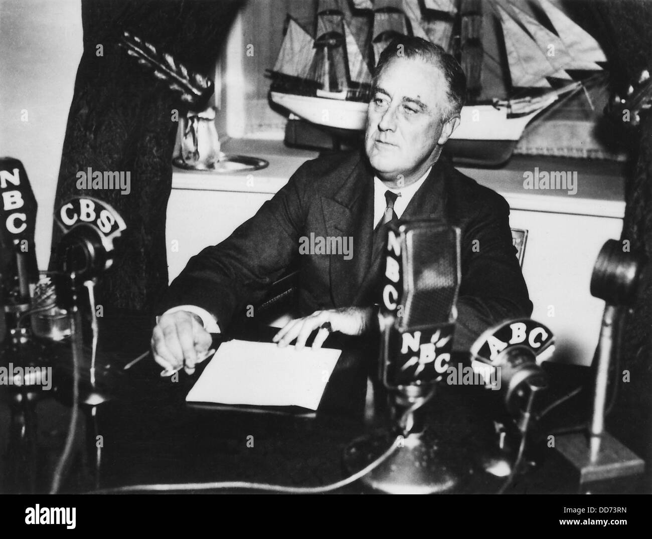 Franklin Roosevelt having a fireside chat from the White House via radio. Apr. 28, 1935. He defended the New Deal, said the Stock Photo