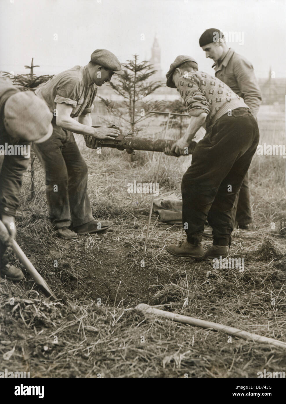 French workers unearthing WWI explosives from the French Frontier zone in 1936. In the early 21st century, the French Stock Photo