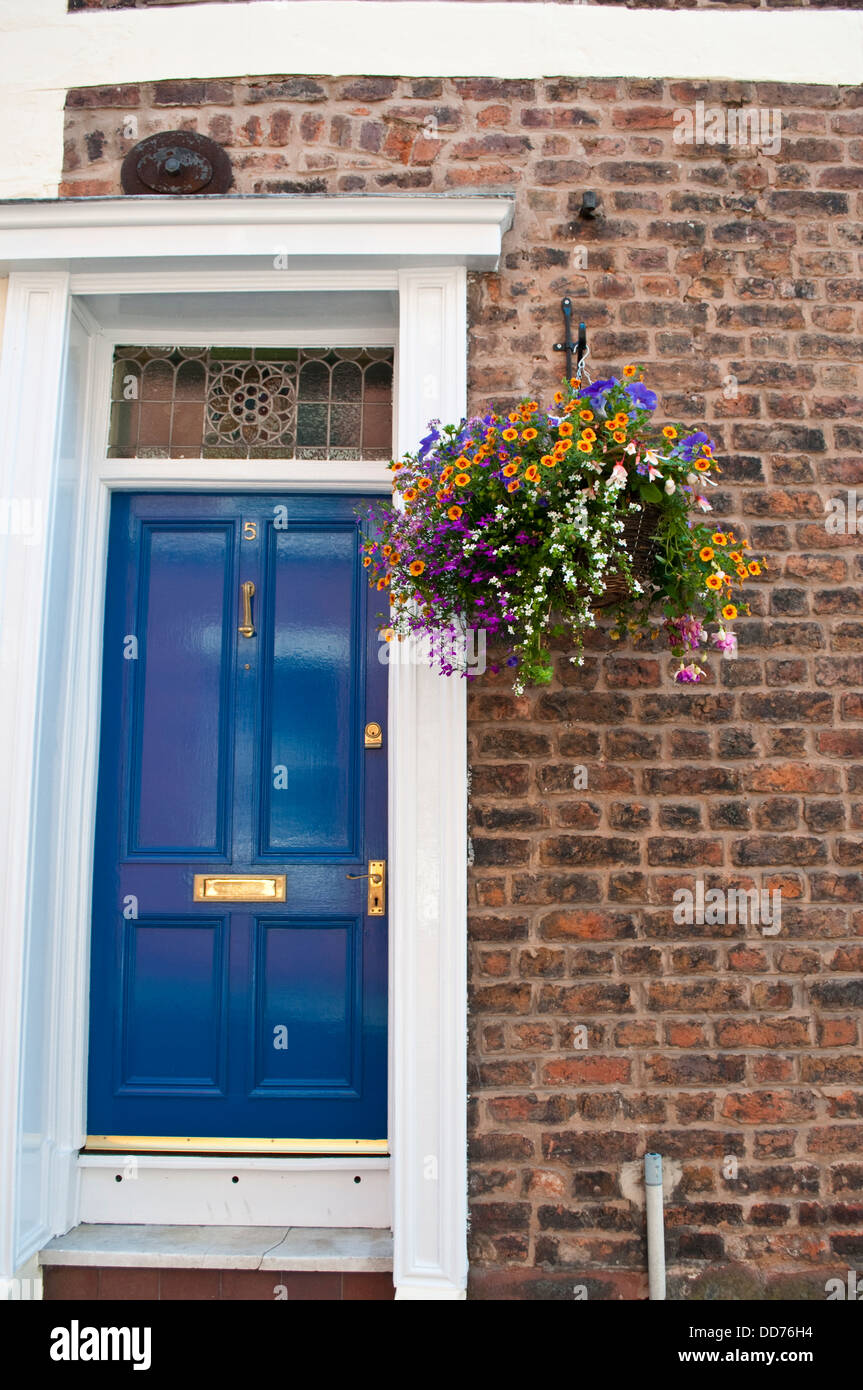Posh house with a flower basket, Lorimers' Row, Chester, UK Stock Photo