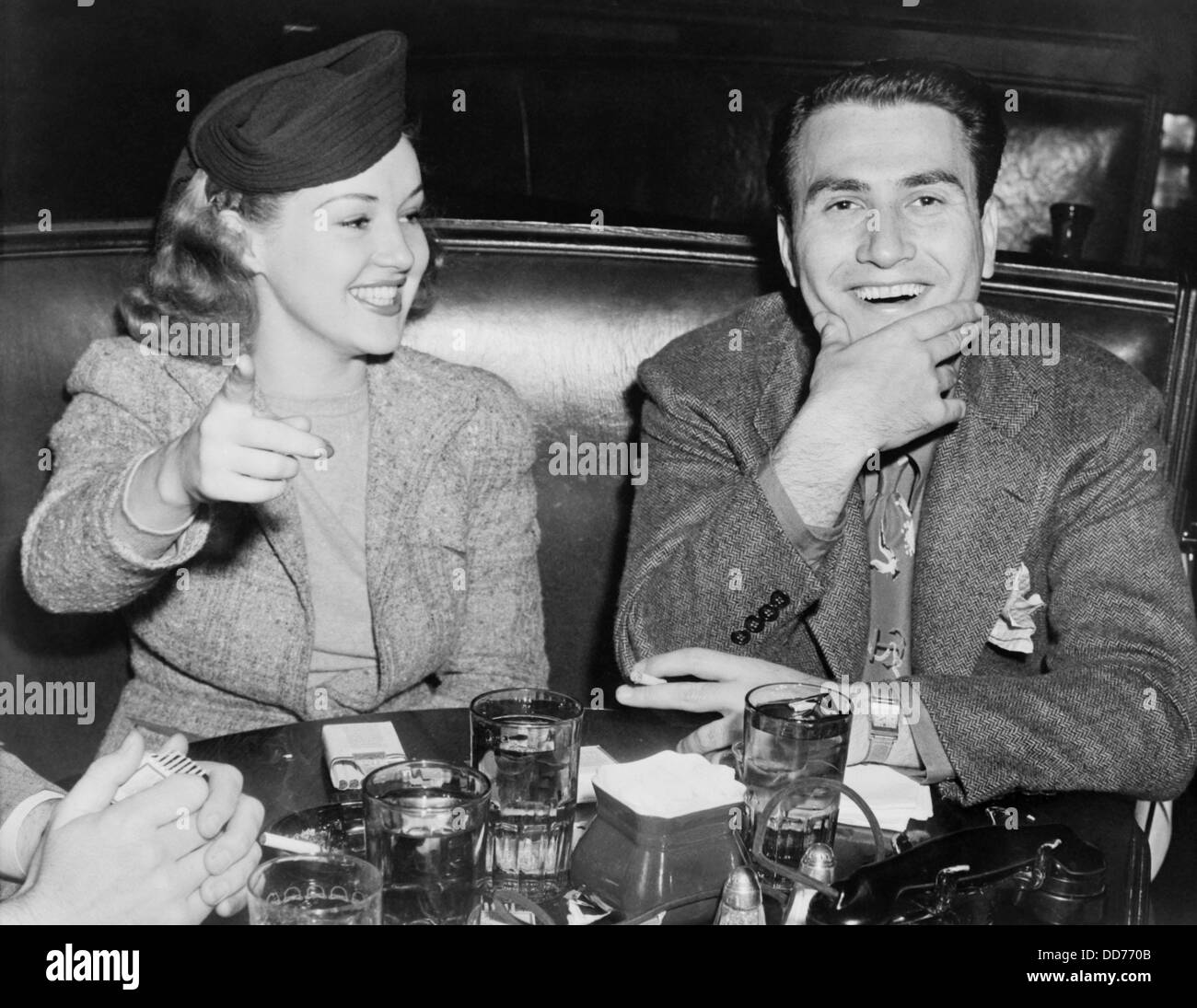Actress Betty Grable and Bandleader, Artie Shaw on a date, Oct. 12, 1939. Shaw was between his 2nd and 3rd marriages (of Stock Photo