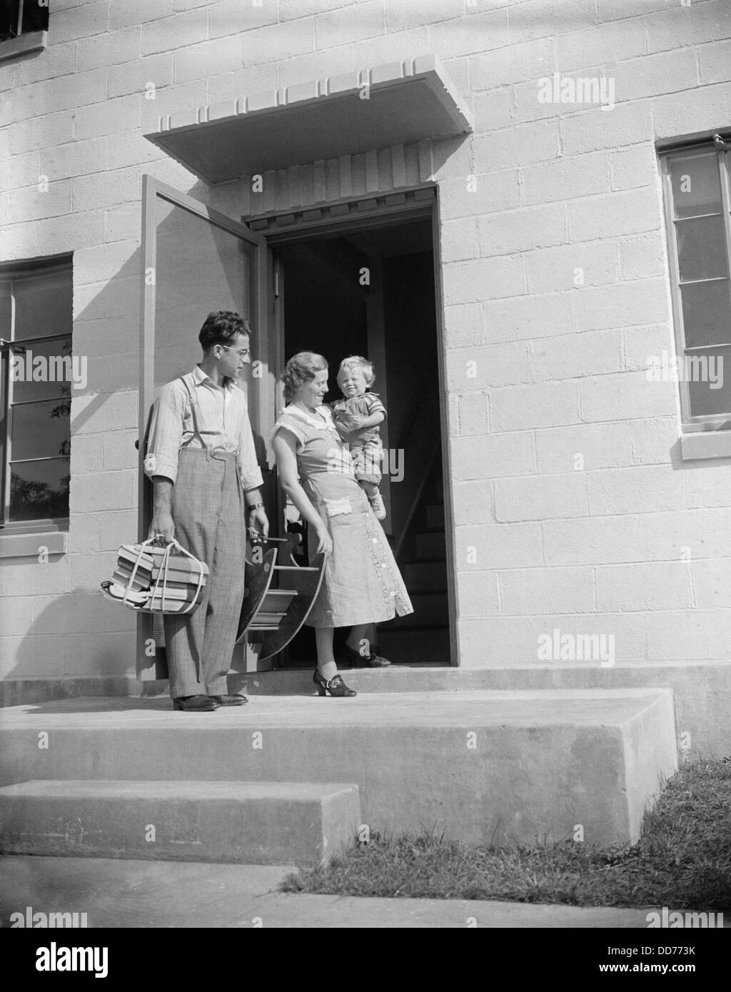 Family moving into their new home at Greenbelt, Maryland, a New Deal planned community, Oct. 1937. Residents acceptance was Stock Photo