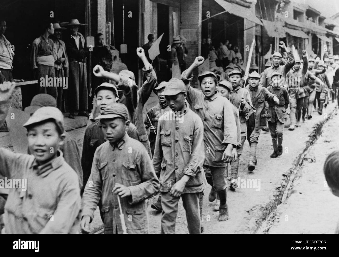 Teenagers returning from pep meeting for China's communist army, Nov. 1, 1937. The young Chinese communist soldiers will fight Stock Photo