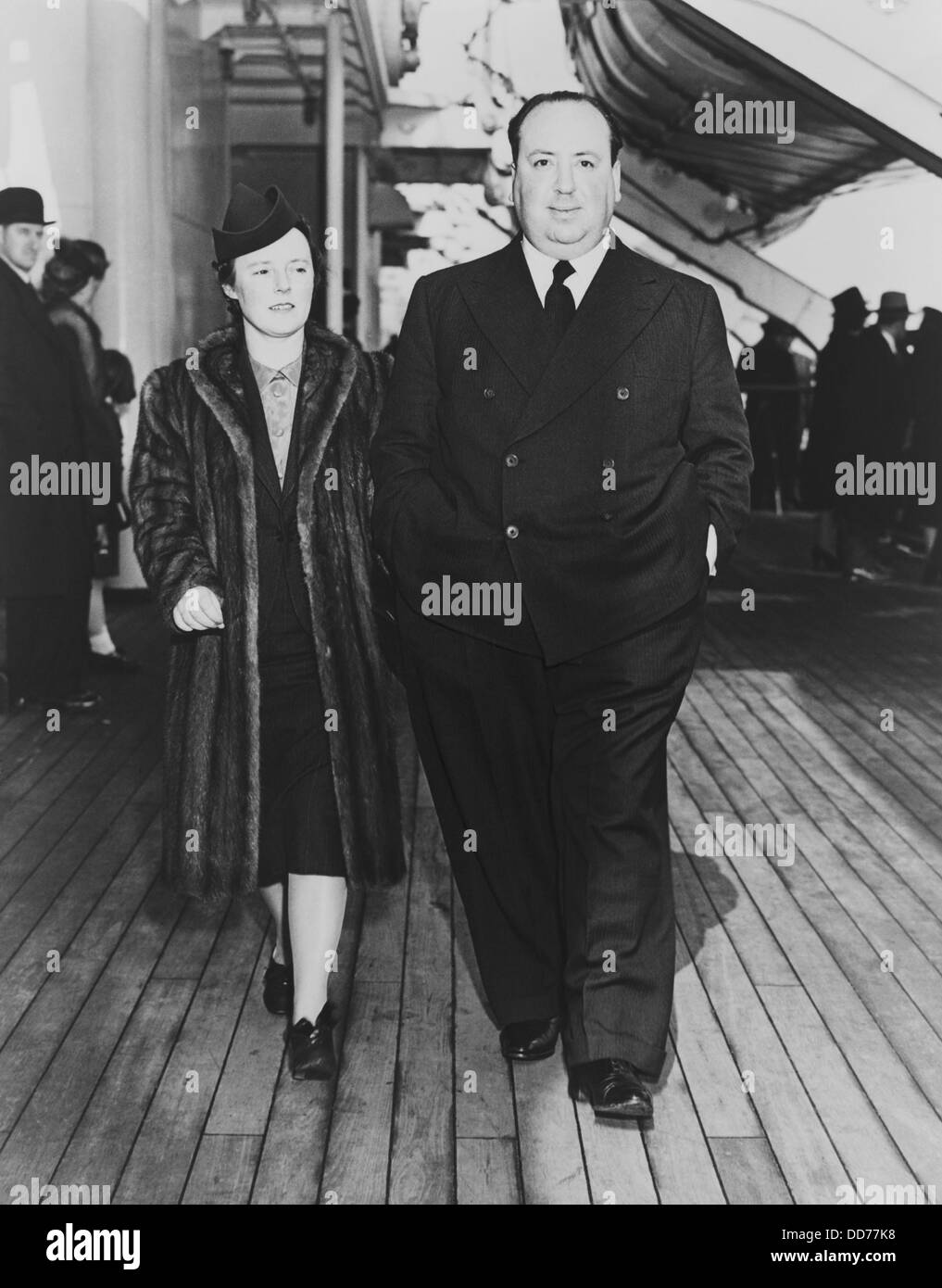 Alfred Hitchcock and his wife, Alma Reville, on deck of the SS Queen ...