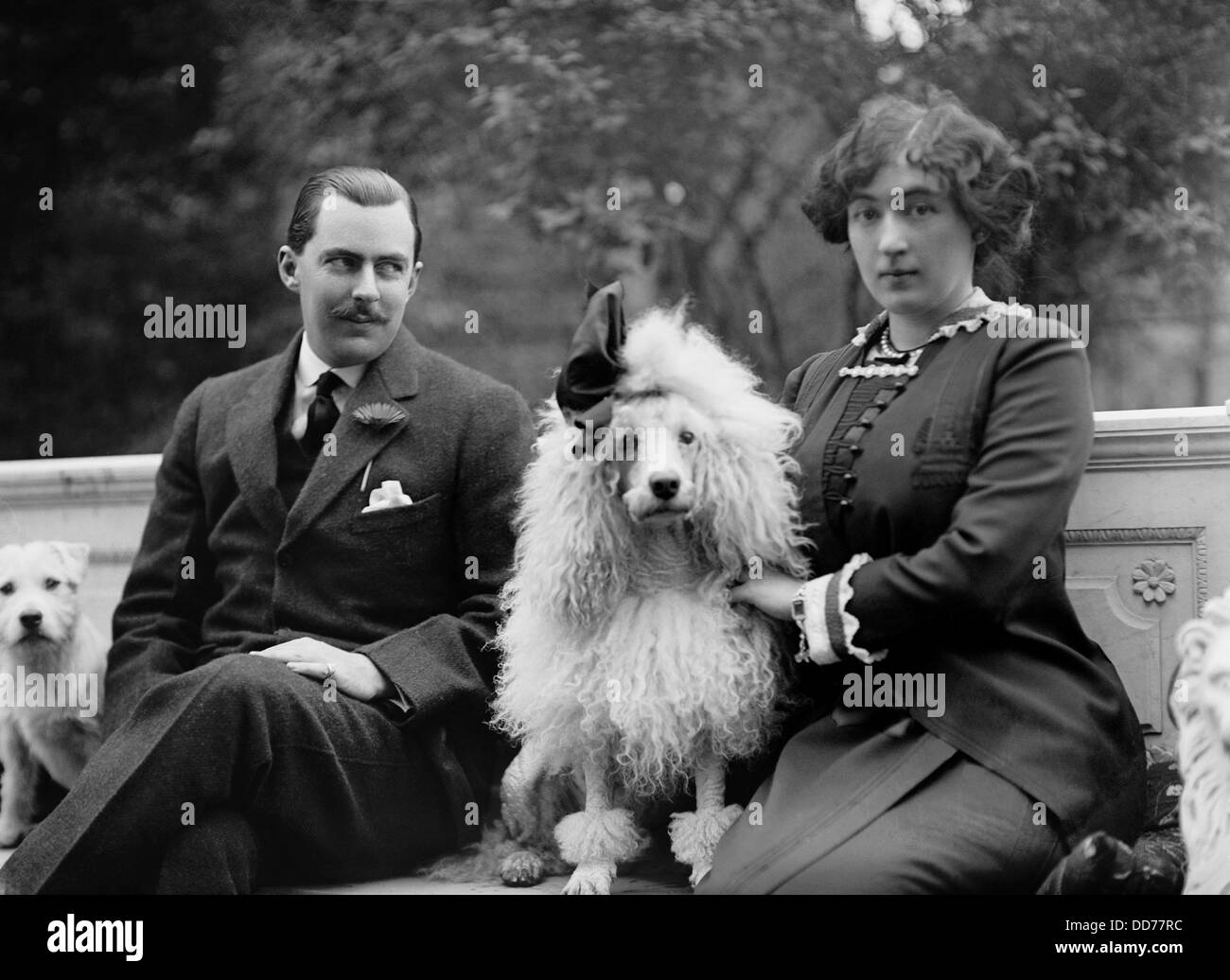 Edward Beale Mclean and his wife, Evalyn Walsh Mclean the their dogs in 1912. She was the only surviving child of an Irish Stock Photo