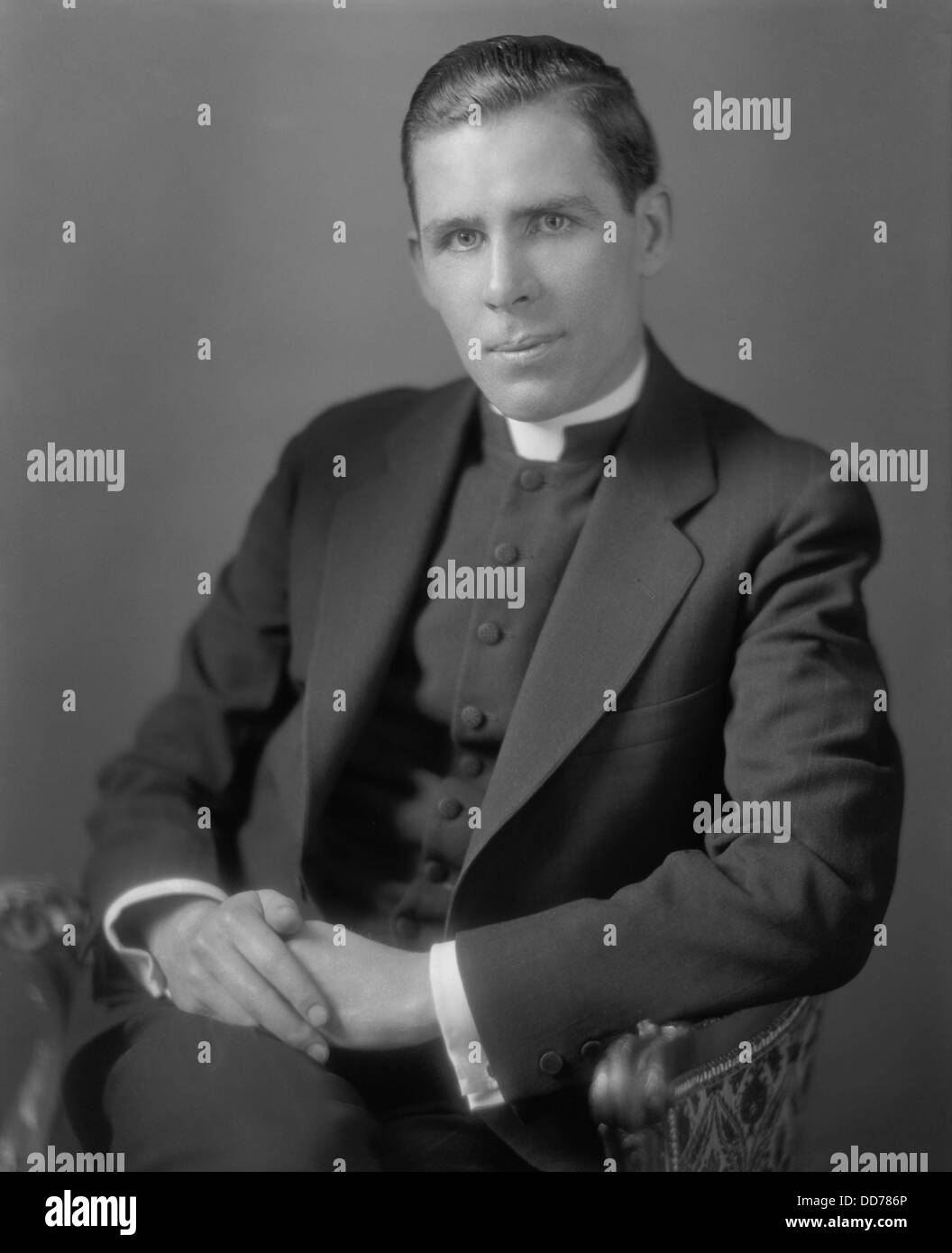 Fulton John Sheen, was a prominent Catholic priest by the age of 35. He hosted the radio program 'The Catholic Hour' from Stock Photo