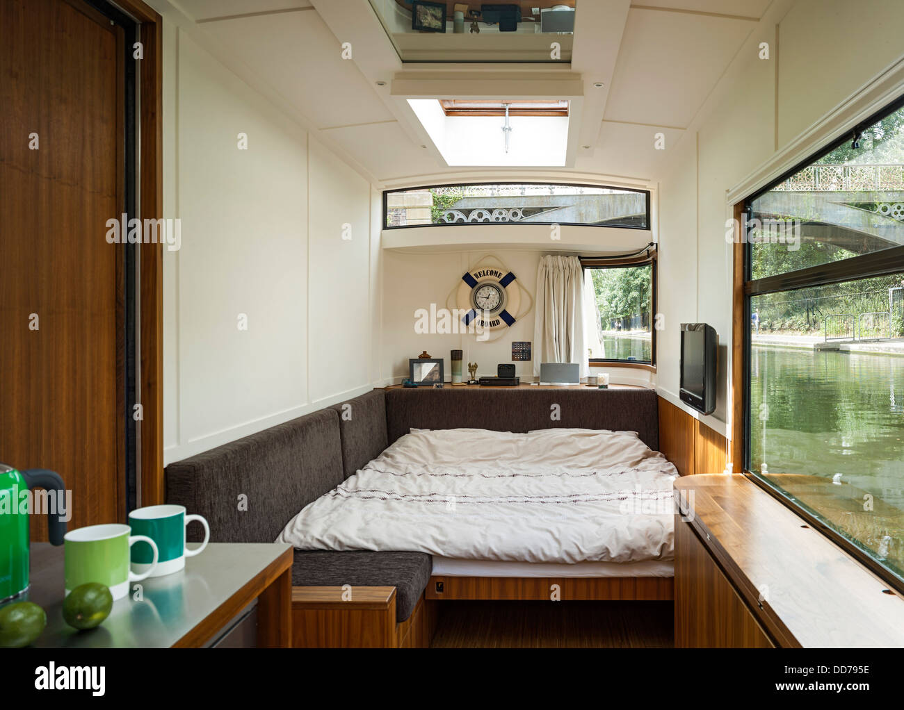 Narrowboat, London, United Kingdom. Architect: Pete Young, 2013. Living area turned into sleeping area. Stock Photo