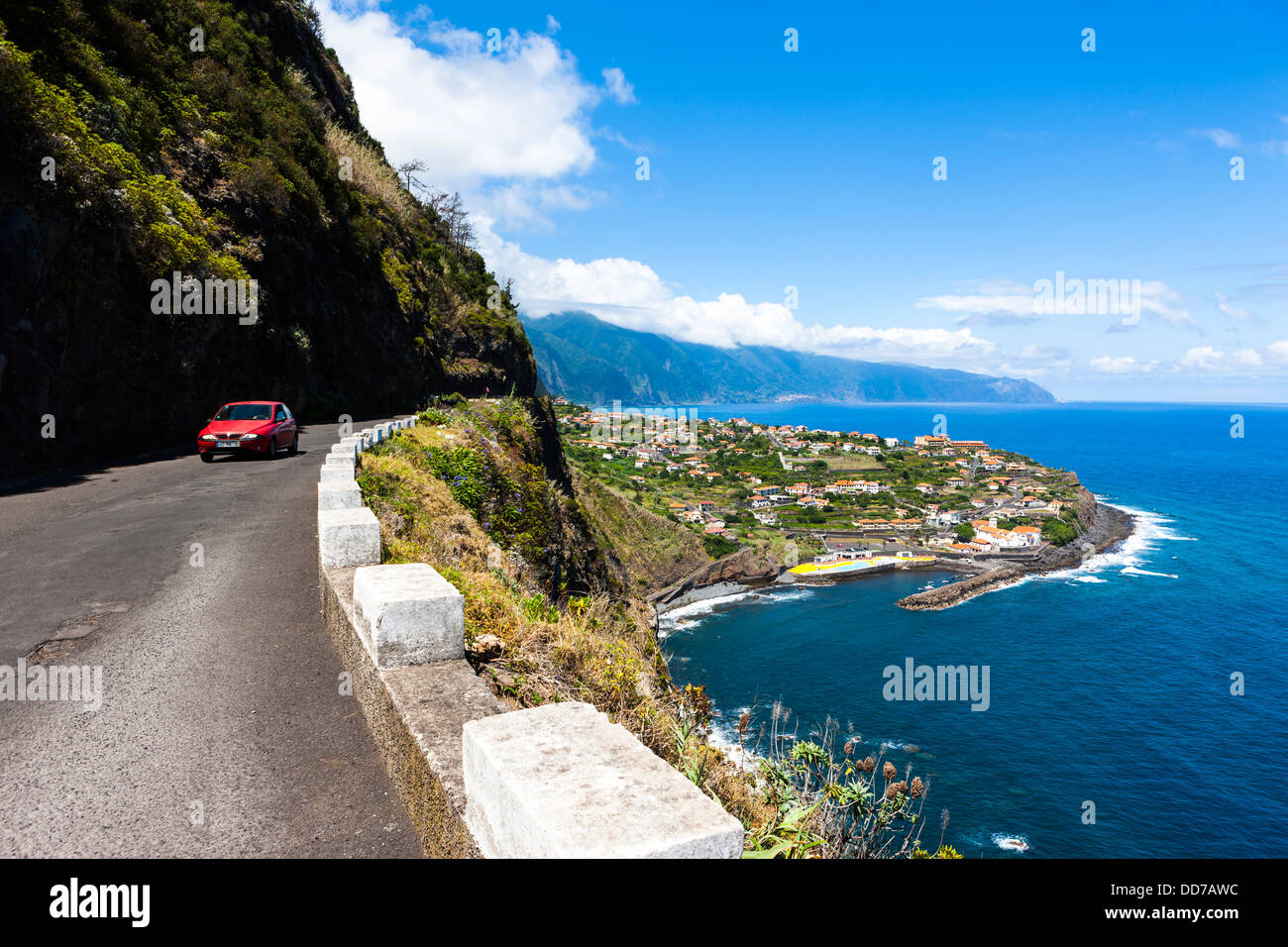 Portugal, Madeira, View of car on road near cliffs of Madeira in Boaventura Stock Photo