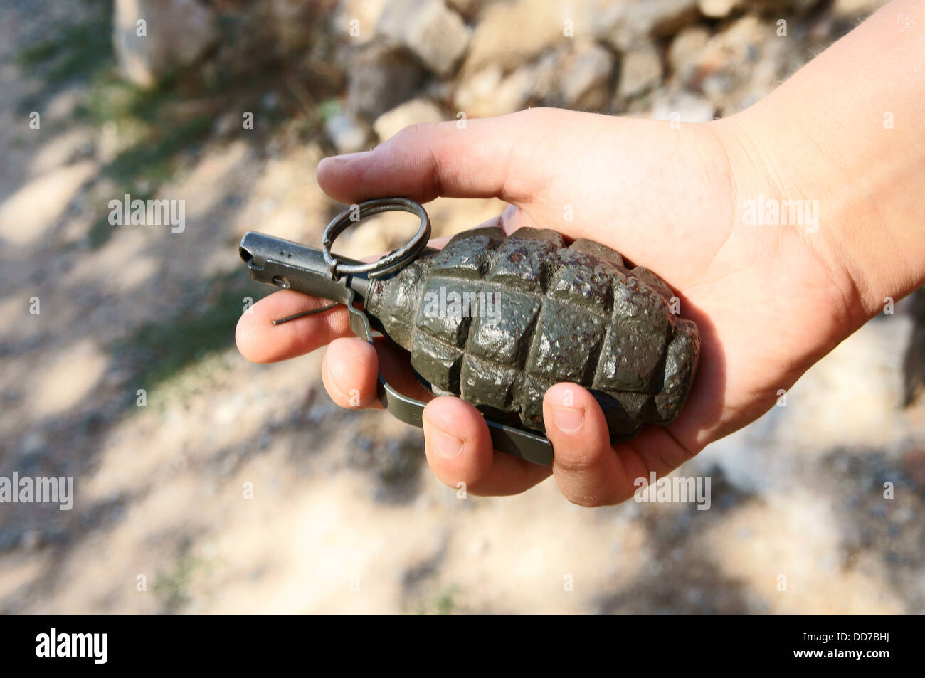Soviet F1 egg hand grenade, weapon, young man, youngster Stock Photo