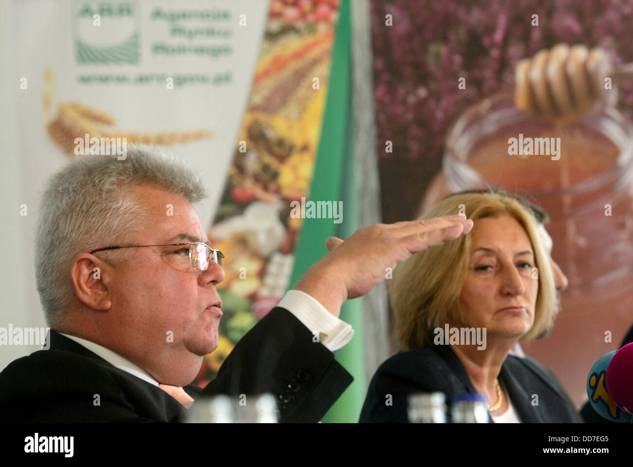 Deputy Minister of the ministry of agriculture and countryside development Zofia Szalczykova (right) and director of the Veterinarian inspection of the Polish Republic Janusz Zwiazek speak during the press conference about the quality of the Polish food products in Prague, Czech Republic on August 28, 2013. (CTK Photo/Michal Kamaryt) Stock Photo
