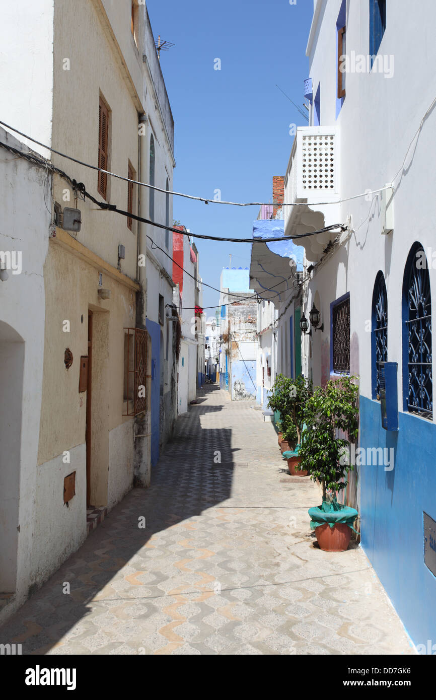 Narrow street in Asilah, Morocco Stock Photo