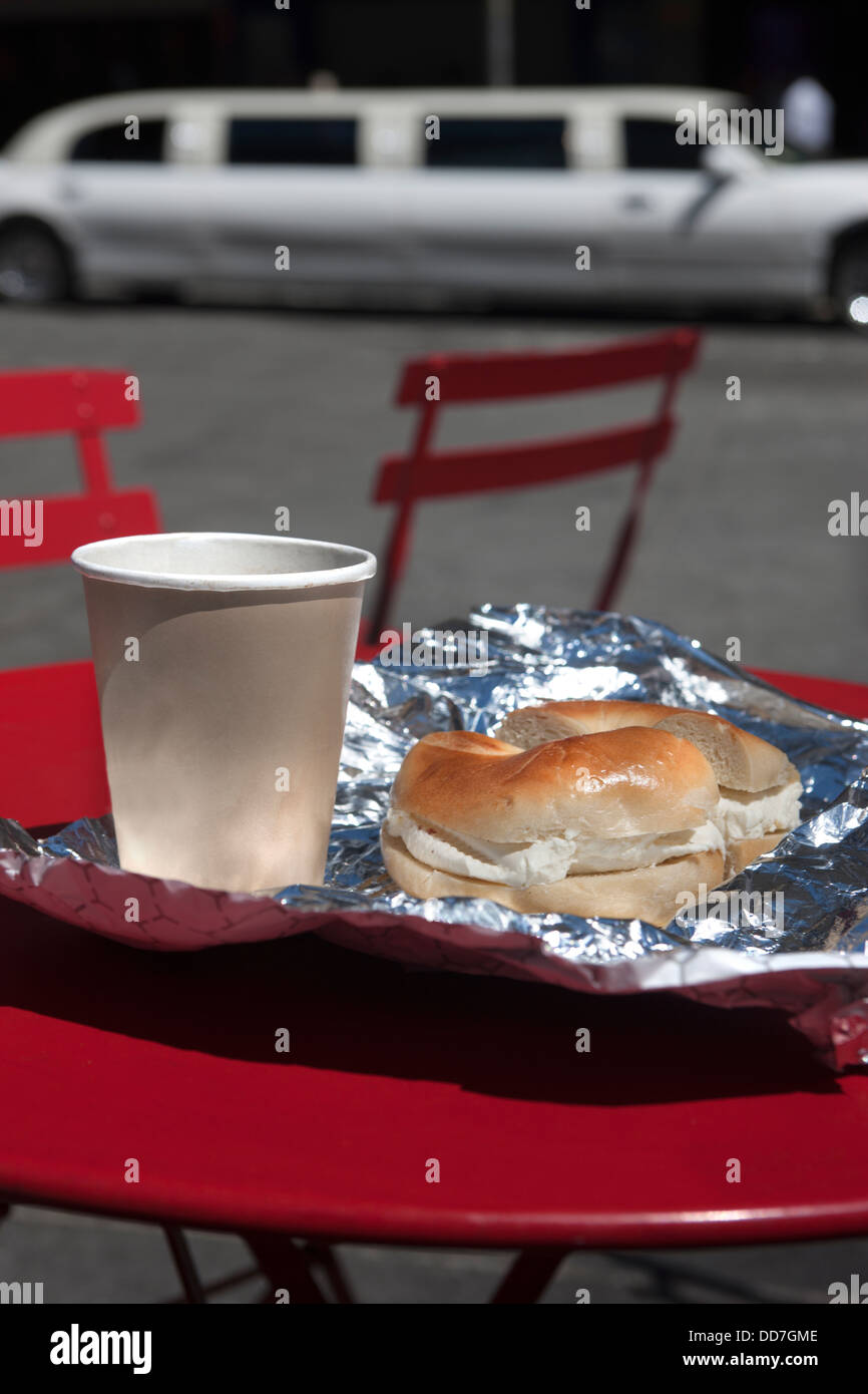 CREAM CHEESE BAGEL COFFEE BREAKFAST RED TABLE TIMES SQUARE MANHATTAN