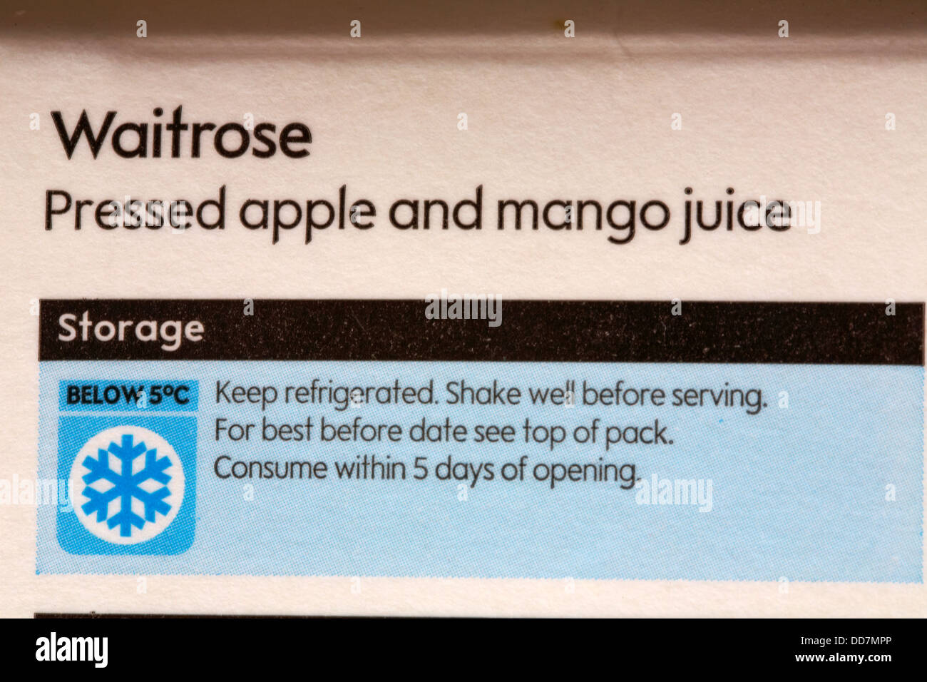 Storage instructions on carton of Waitrose pressed apple and mango juice Stock Photo