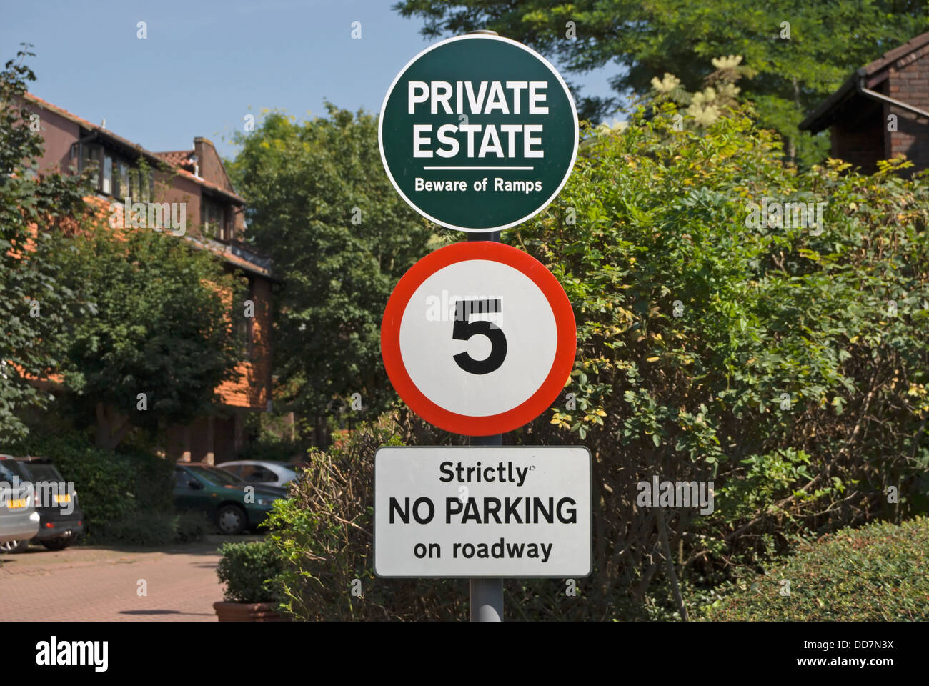signs for private estate, a 5mph speed limit, and strictly no parking