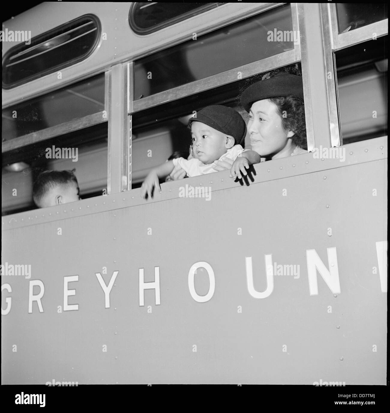 Gila River Relocation Center, Rivers, Arizona. Aboard the Greyhound bus