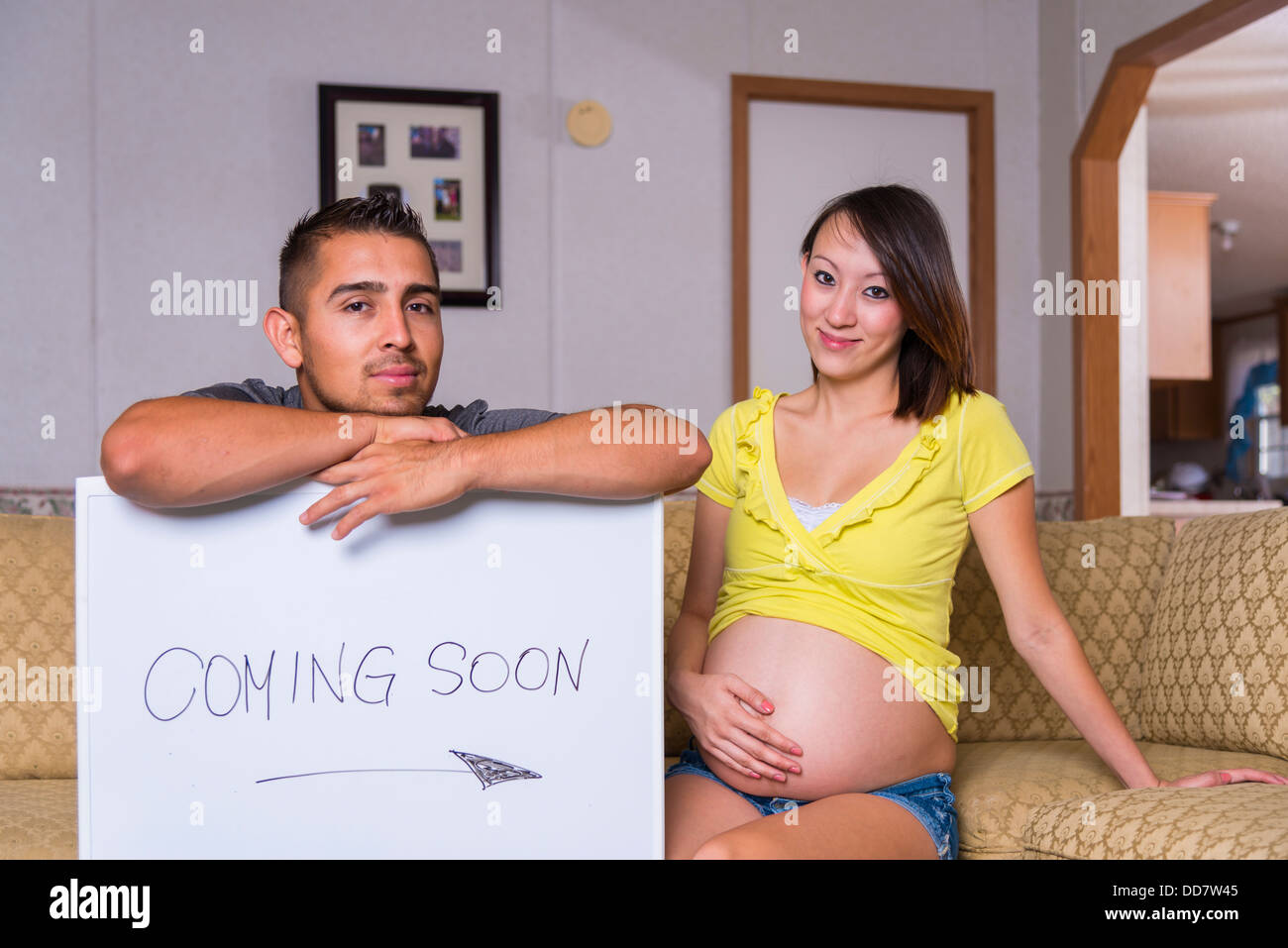 Expecting parents - Multi ethnic couple Stock Photo