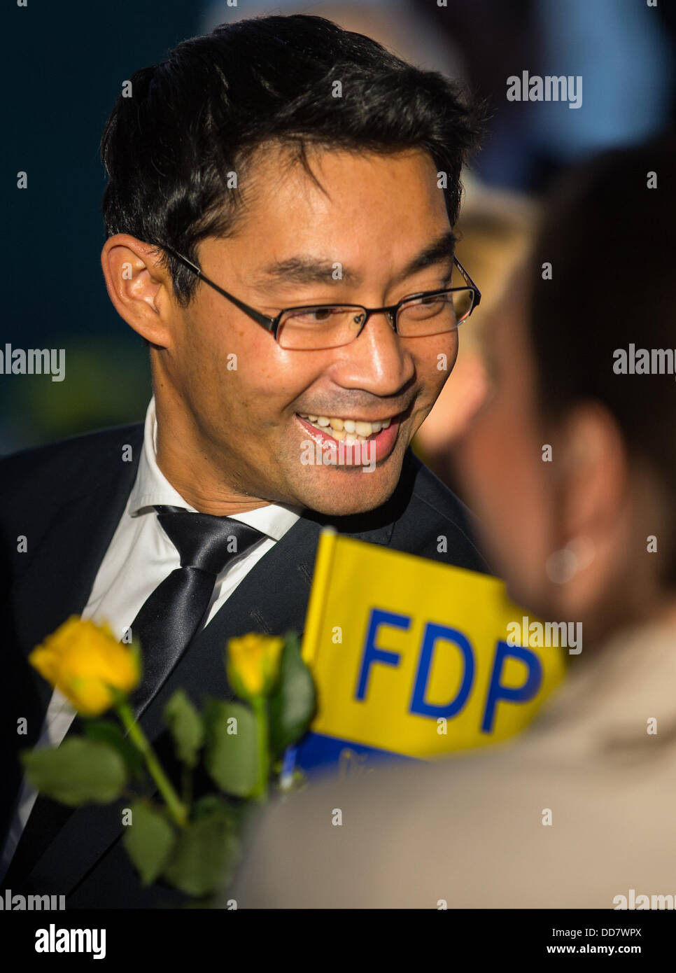 German Minister of Economics and Technology Philipp Roesler sits in the audience at an election campaign event of the Free Democratic Party in Berlin, Germany, 28 August 2013. Photo: HANNIBAL Stock Photo