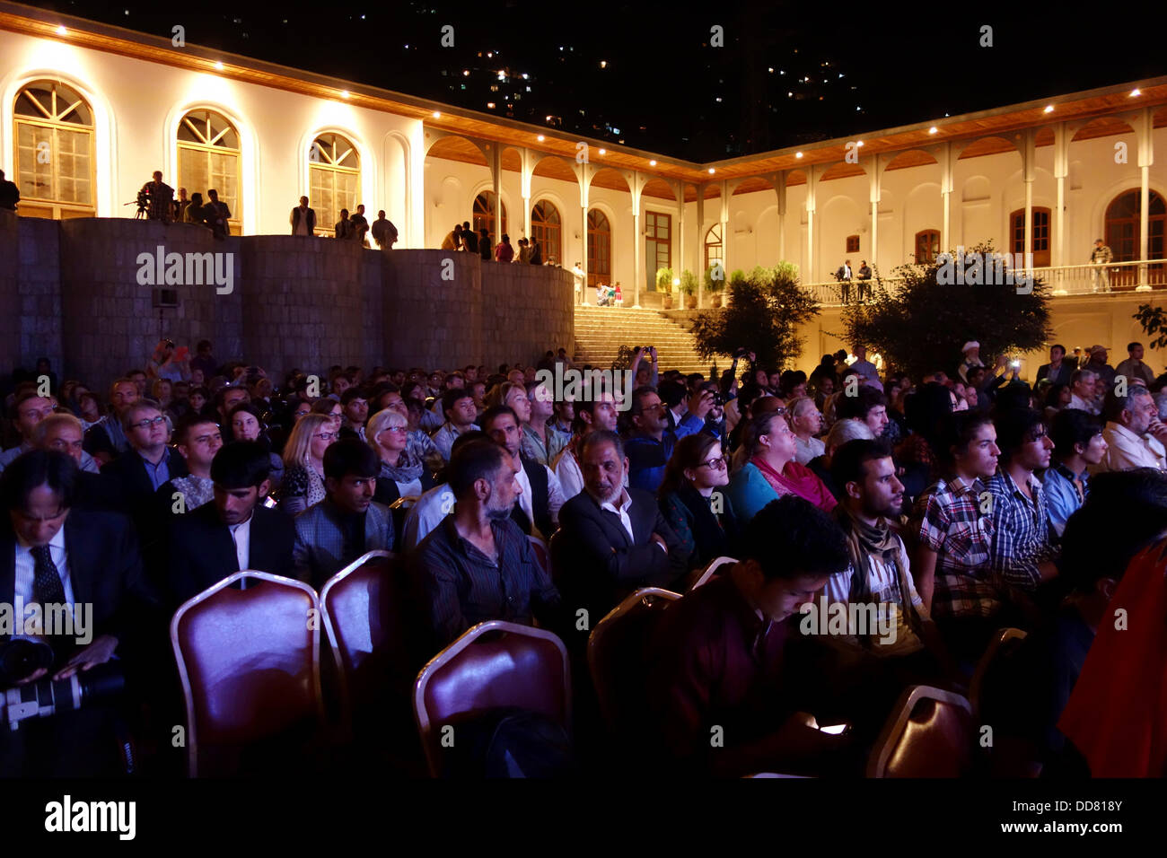 Audience watch during the performance of five Afghan master musicians