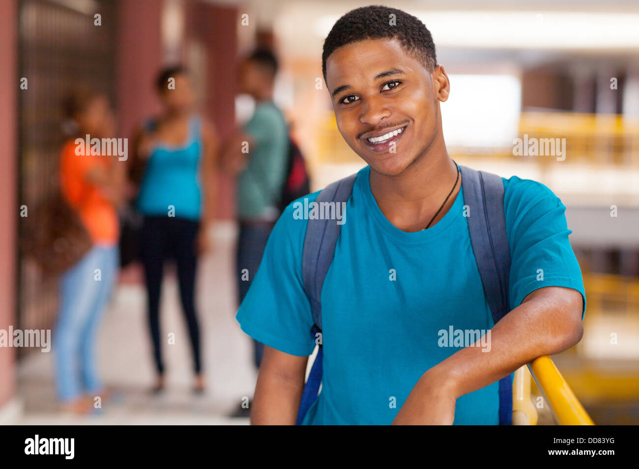 handsome male African college student looking at the camera Stock Photo