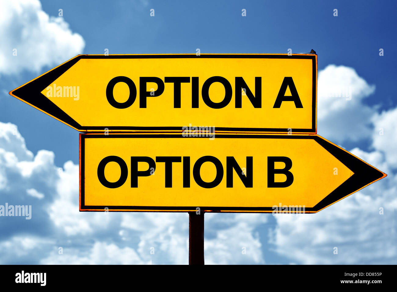 Option A or option B, opposite signs. Two opposite signs against blue sky background. Stock Photo