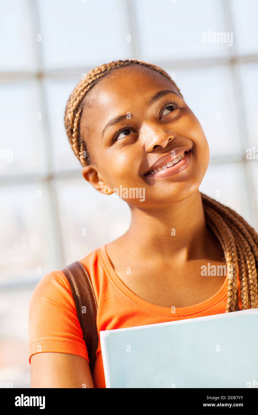pretty African American college girl looking up Stock Photo - Alamy