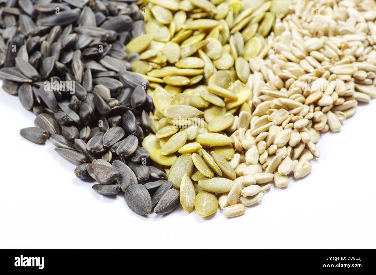 Тыквенные и подсолнечные семечки. Тыквенные и подсолнечные семечки. Семечки. Семечки подсолнуха и тыквы. Тыквенные и подсолнечные семечки.