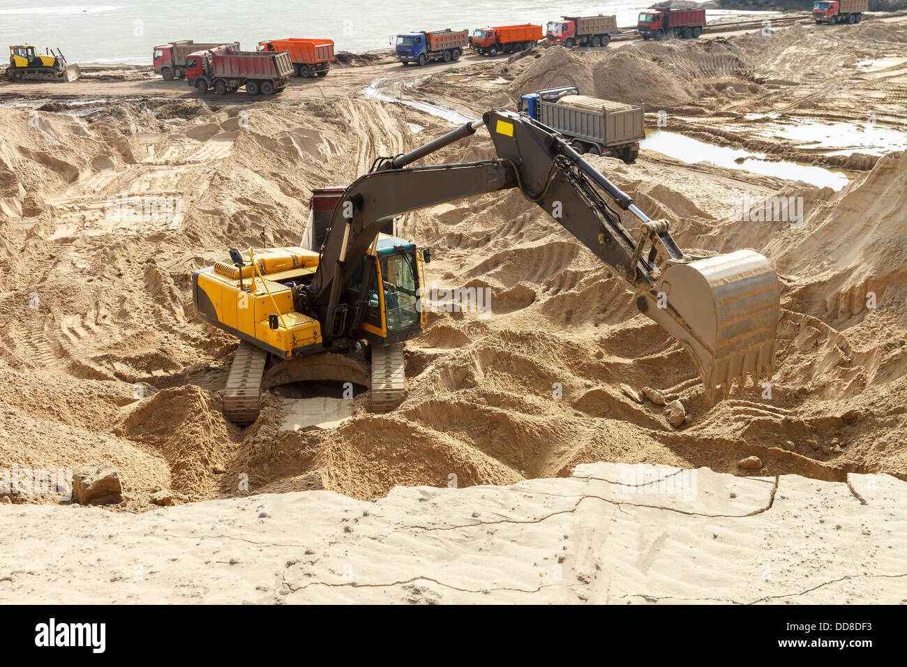 Yellow Excavator work at Construction Site Stock Photo - Alamy