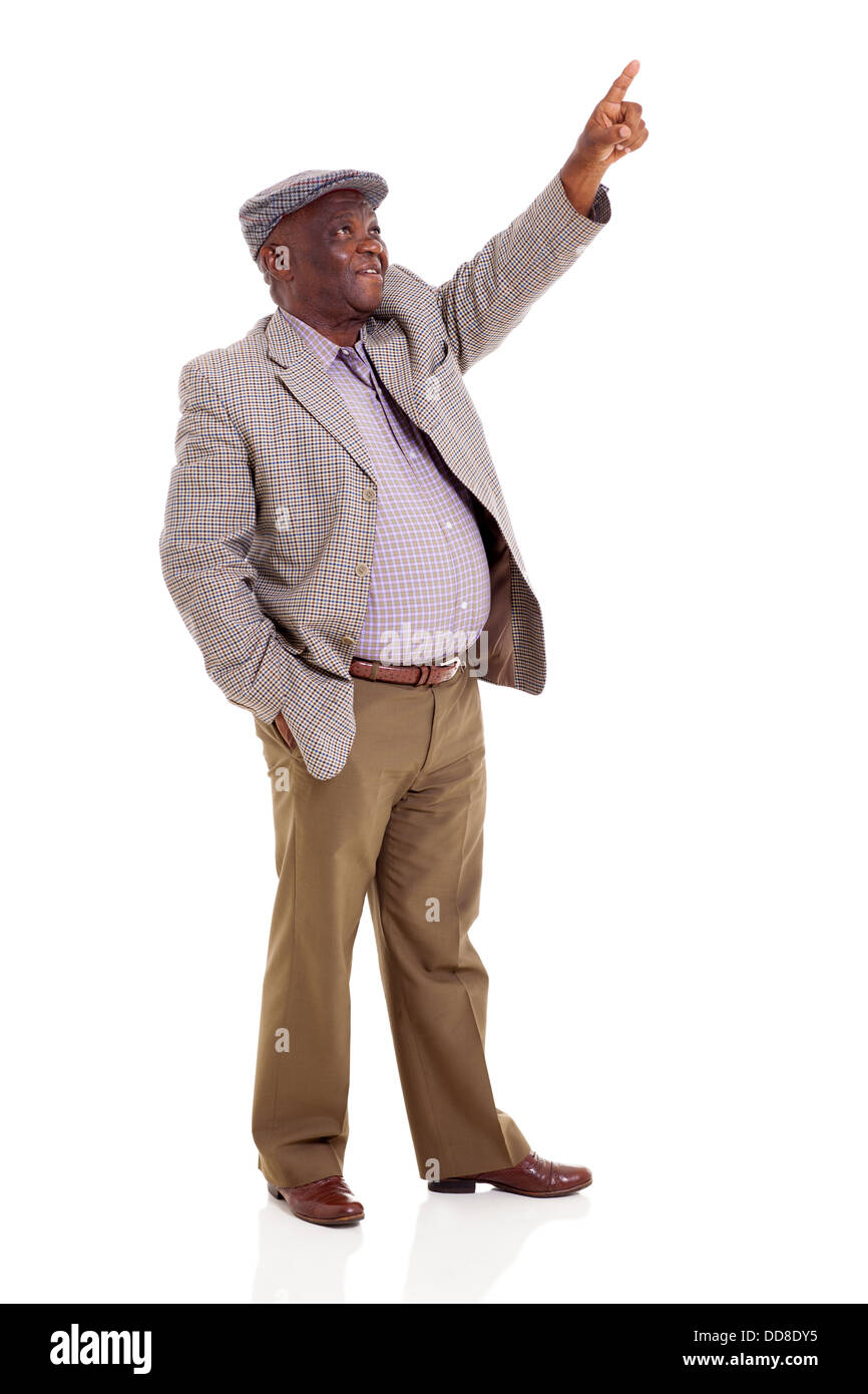 senior African man pointing up isolated on white Stock Photo