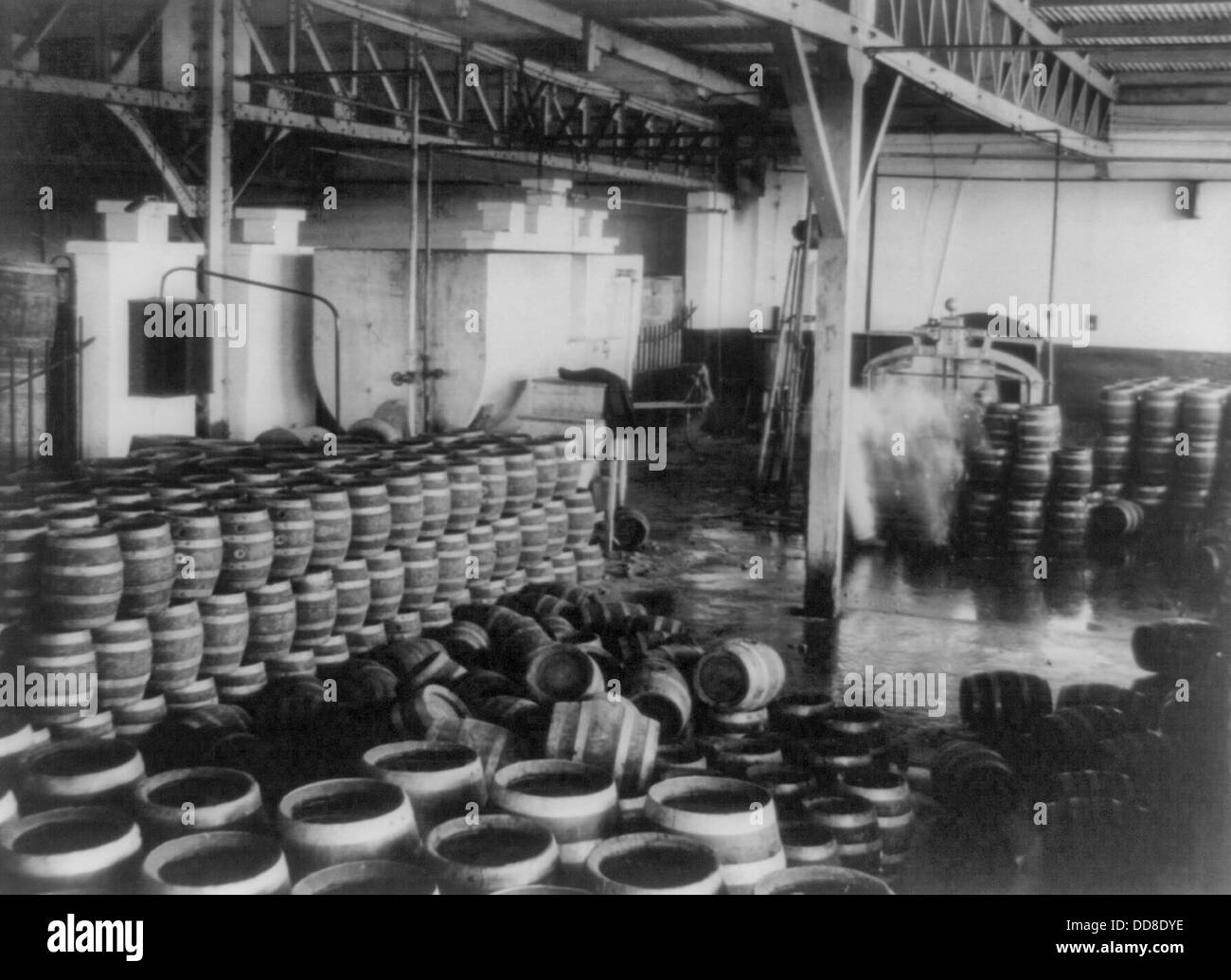 Barrels of confiscated liquor in building during USA Prohibition, circa 1925 Stock Photo