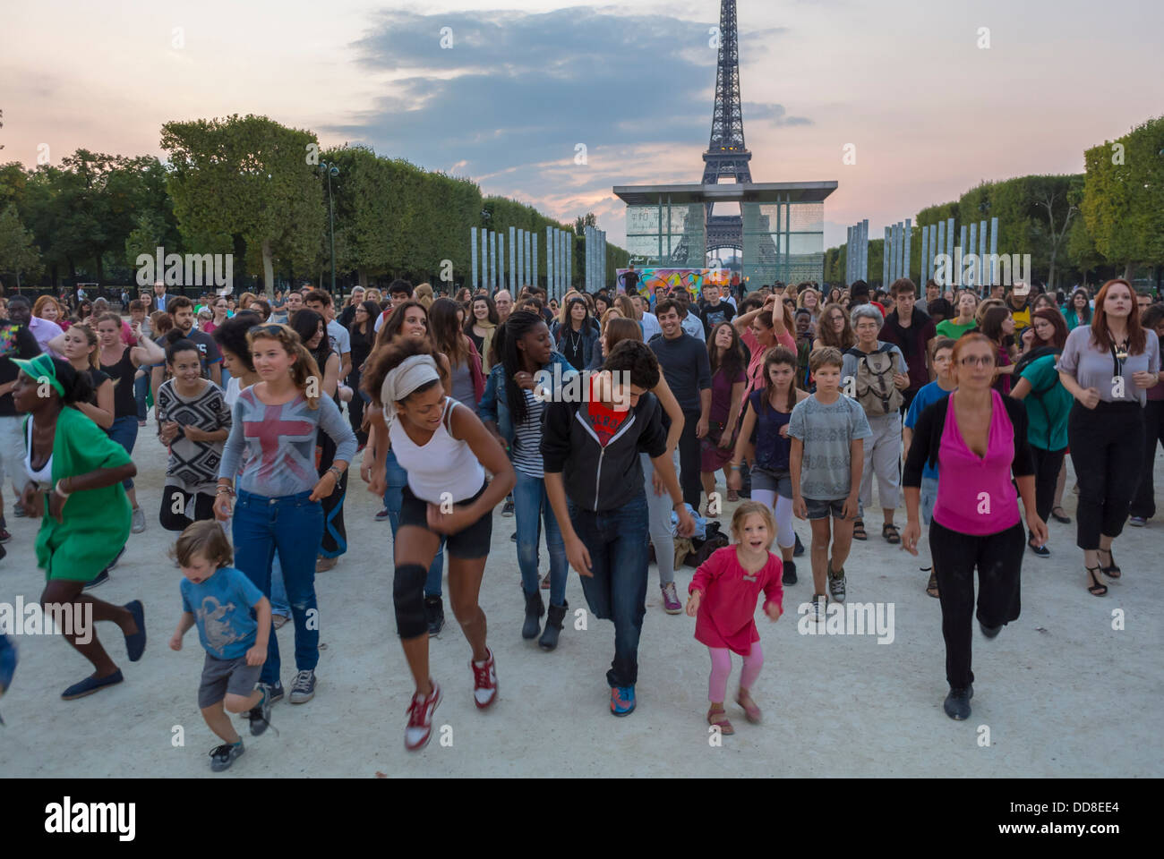 Paris, France, Diverse Crowd of People Dancing Near Eiffel Tower Stock