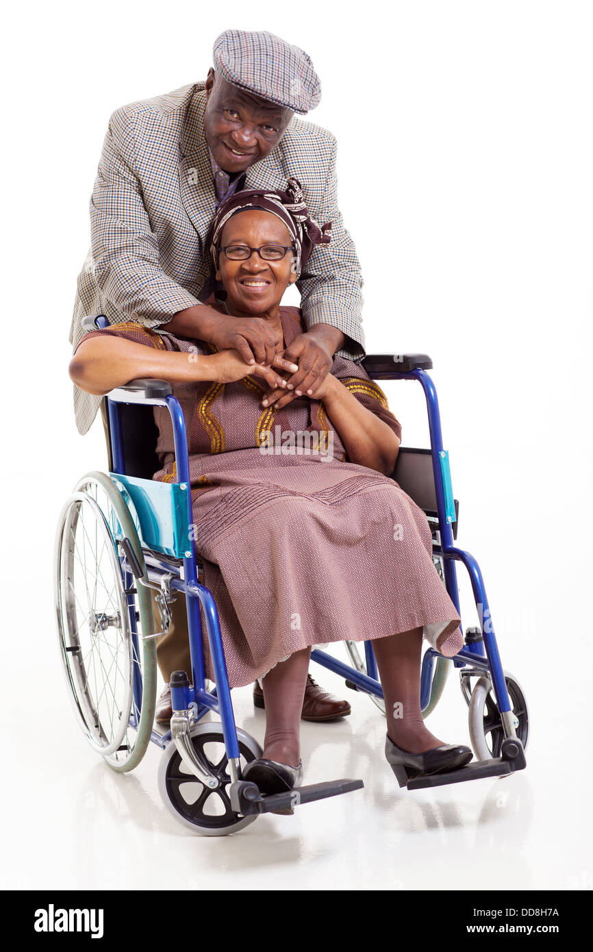 happy disabled senior African woman and her caring husband on white