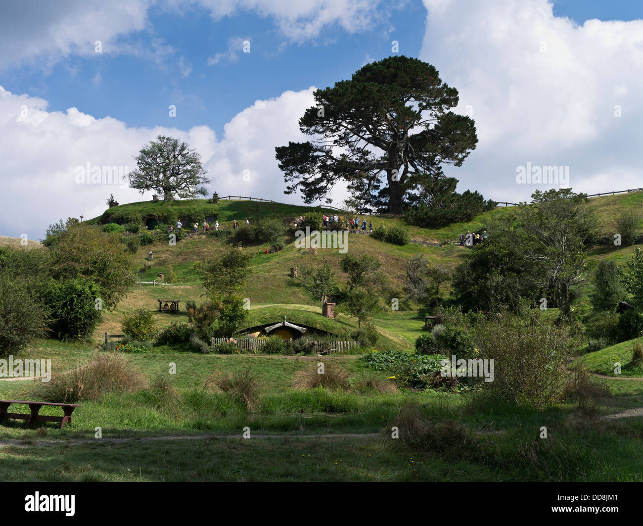 dh Lord of the Rings village HOBBITON NEW ZEALAND Hobbits tours film set movie site films people tourism hobbit tour middle earth shire tourist Stock Photo