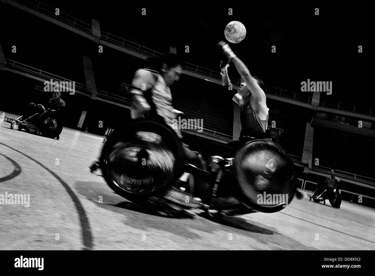 Moises Alonso crashes into Cristian Amaya during a wheelchair rugby training match at the arena in Bogota, Colombia. Stock Photo