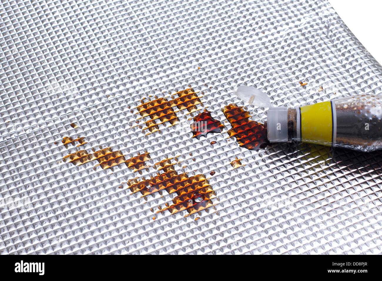 soy bean sauce stained on the foil sheet Stock Photo