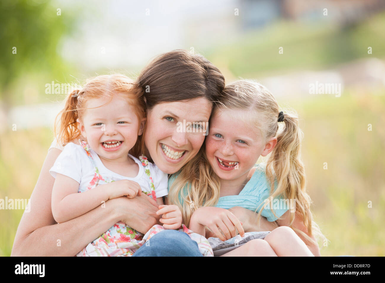 Portrait mother two daughters 2 3 hi-res stock photography and images ...