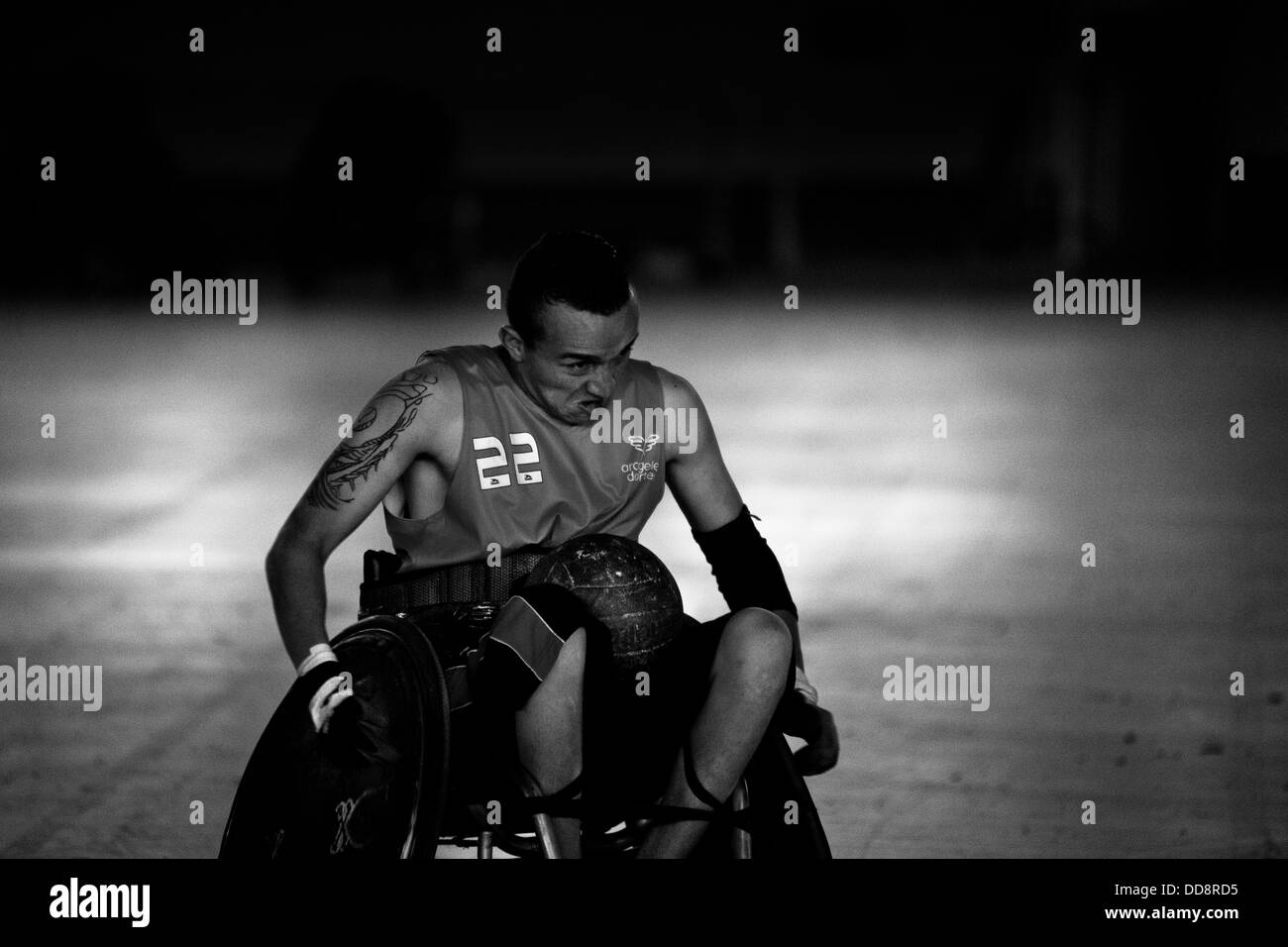 A Colombian disabled athlete, in action during a wheelchair rugby training match at the arena in Bogota, Colombia. Stock Photo