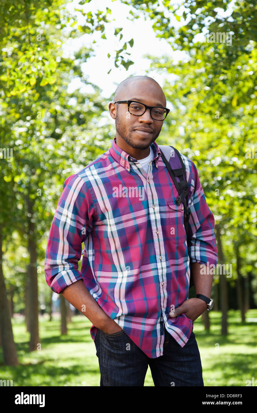 Black man smiling in park Stock Photo