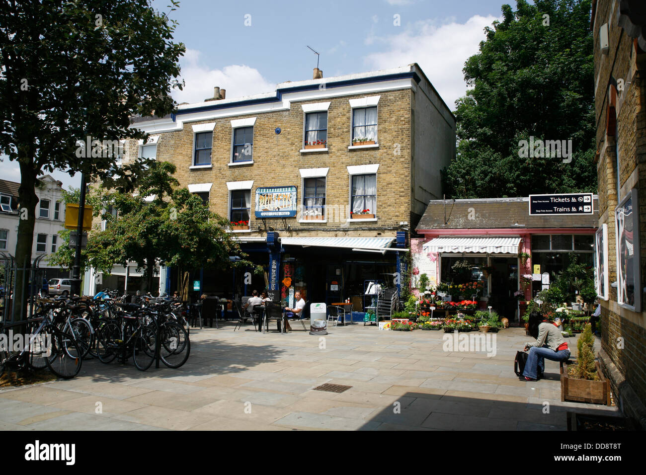 Pullens restaurant and Flower Lady florist on Railton Road, Herne Hill, London, UK Stock Photo