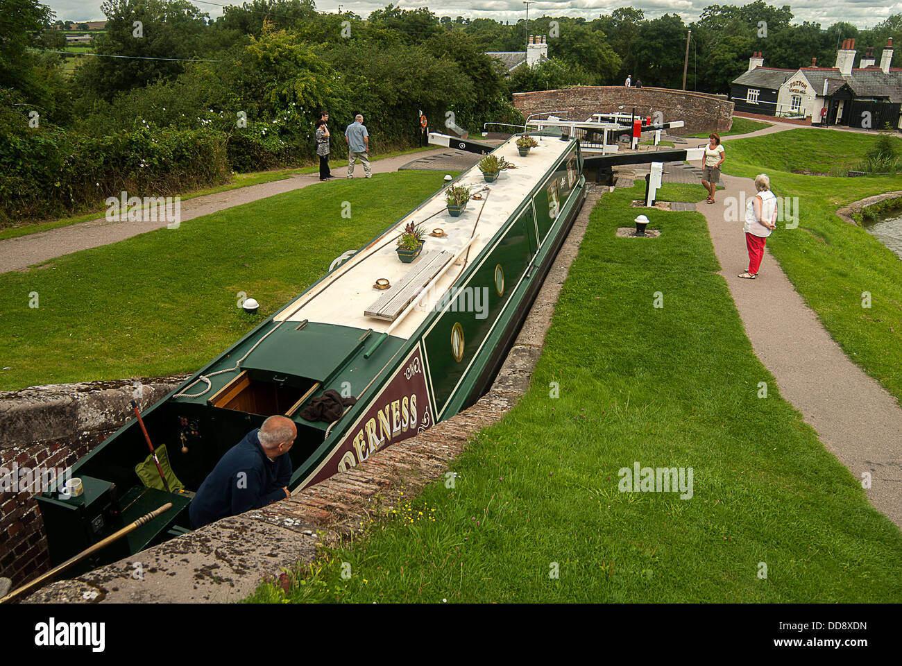 photograph of narrow boat using the locks Stock Photo Alamy