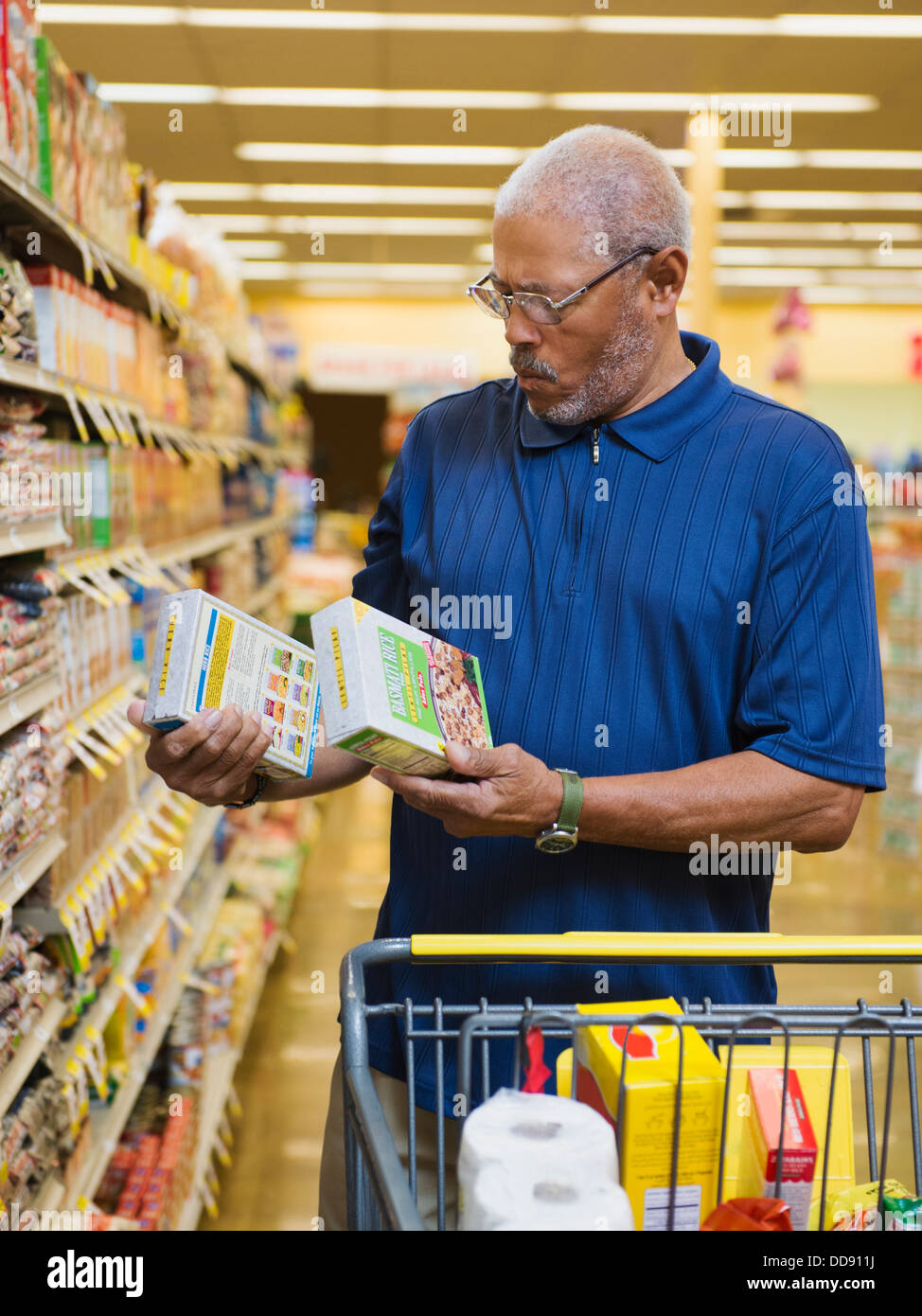 African American man shopping in grocery store Stock Photo Alamy