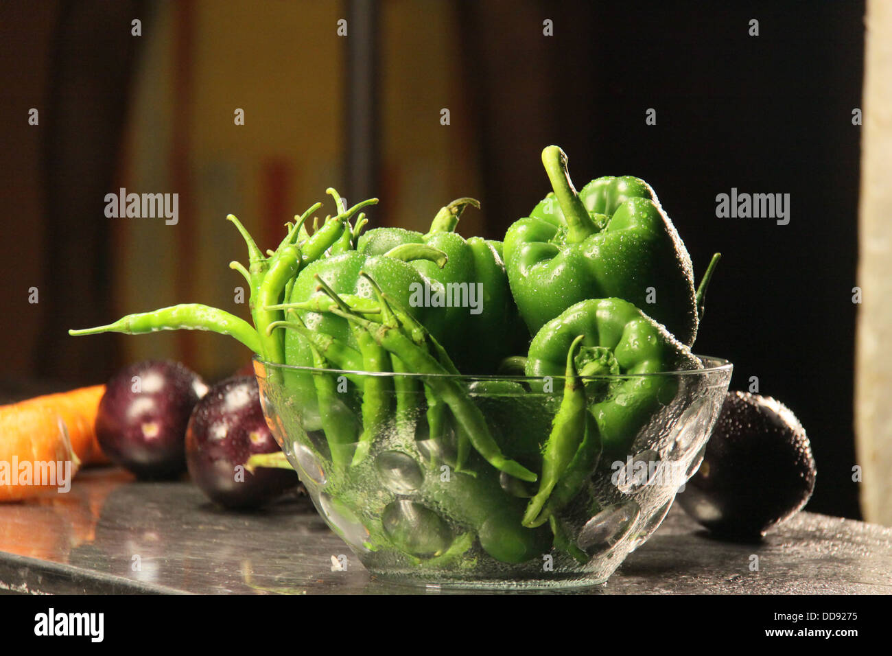 Capsicum and chilly in kitchen Stock Photo