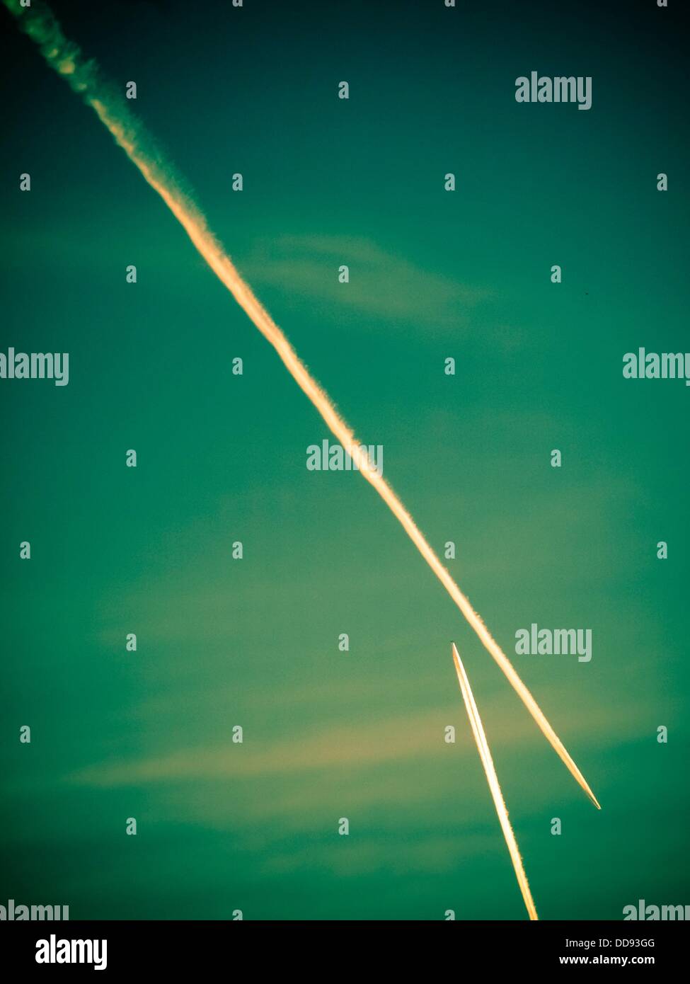 Planes, vapor trails in sky Stock Photo Alamy