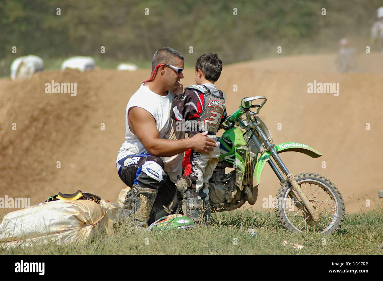 Download Father and son after crash on MX cycle dirk race track ...